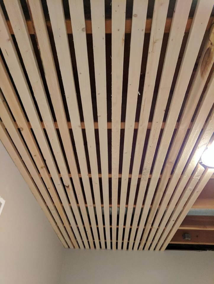 unfinished basement ceiling ideas - 19. Using Wood Pallets to Cover Exposed Ceiling - Harptimes.com