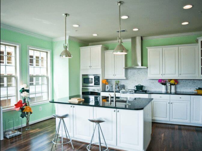 green kitchen cream cabinets