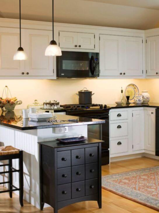 pictures of white kitchens with black appliances