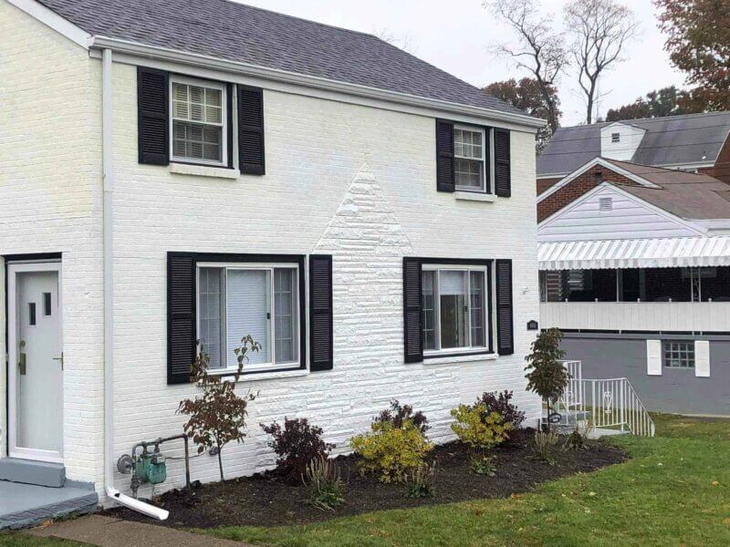 painting exterior brick white house